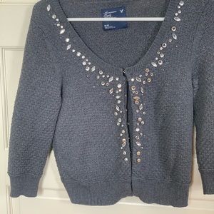 Gray cropped sweater with rhinestones